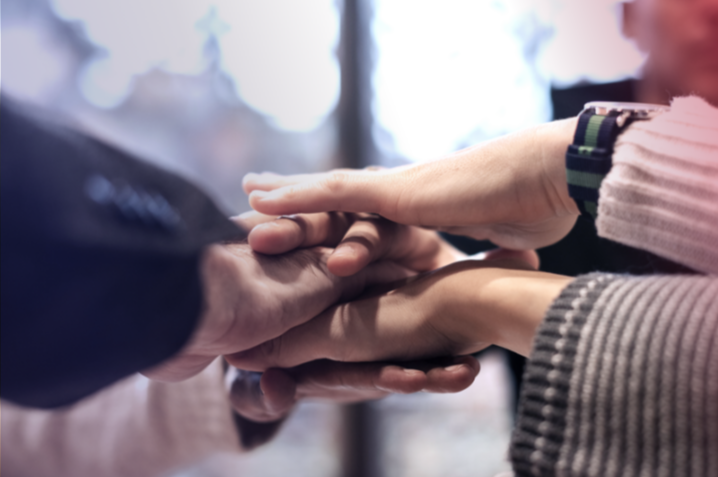 Close-up of people shaking hands 