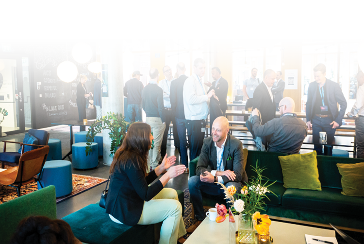 Attendees networking and engaging in discussions at Consafe Logistics' customer event, Connect.