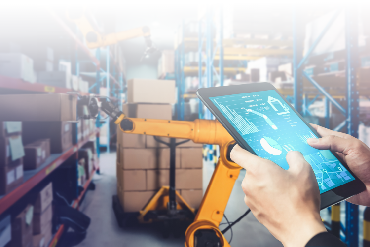 Hands holding screen tablet with a warehouse control system, WCS software in an automated warehouse