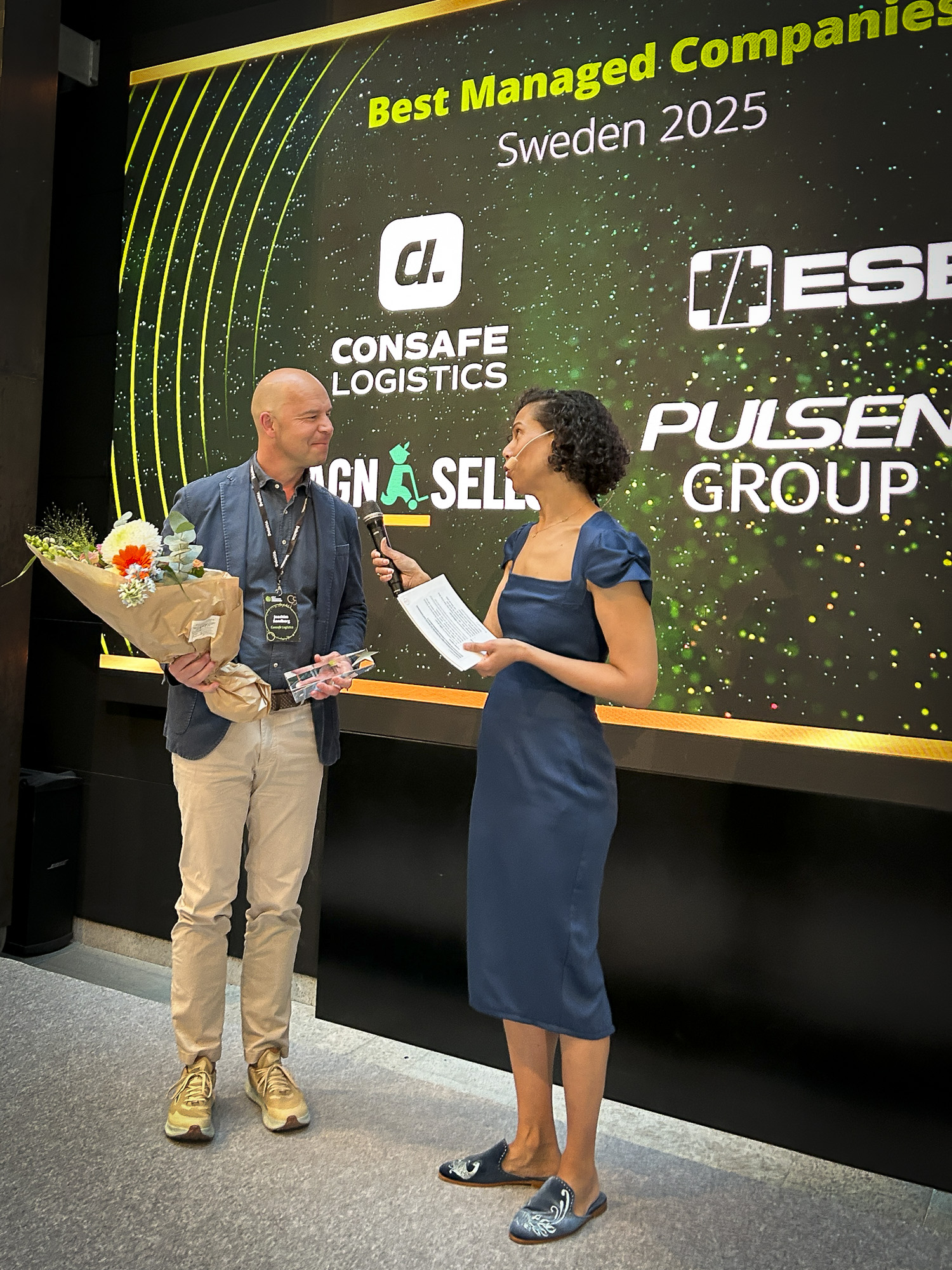 Consafe Logistics CFO Joakim Sandberg interviewed on stage while receiving a Best Managed Companies award.