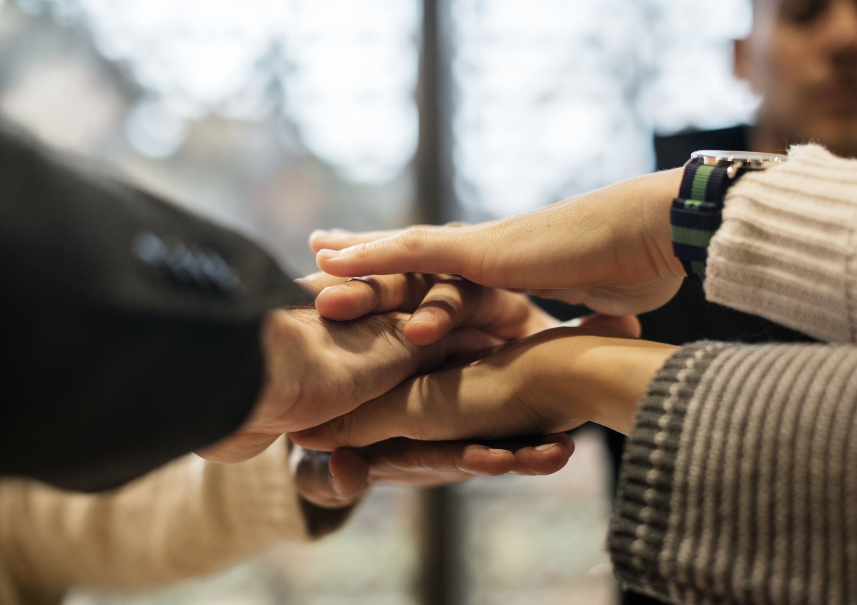 hands togheter for demonstration of teamwork