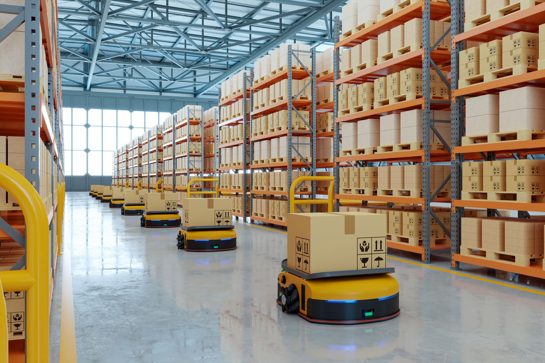Warehouse robots delivering packages controlled by a SAAS WMS software. 